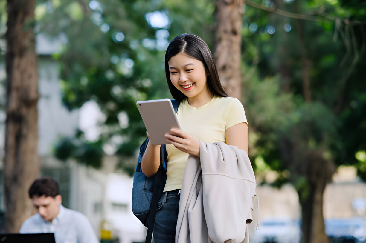 lady reading on her tablet