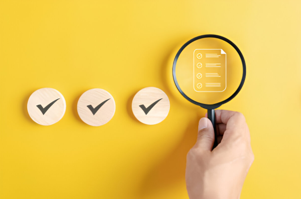 magnifying glass with checklists